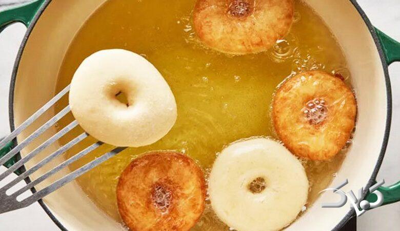 چگونه دونات خانگی درست کنیم ؟طرز تهیه دونات خانگی نرم و پفدار با روکش شکلاتی